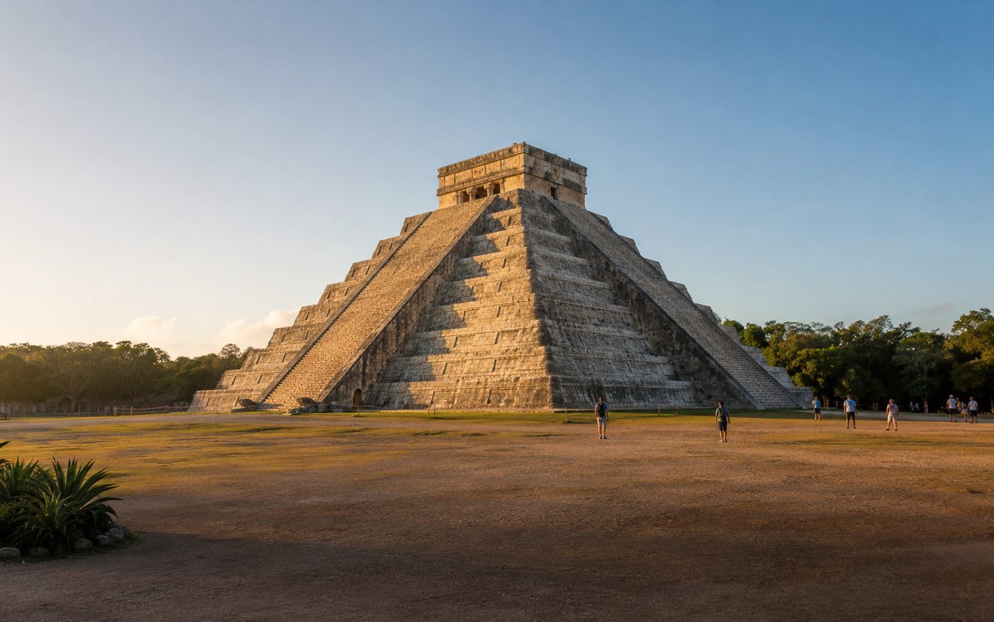 El Castillo at Chichén Itzá in the early morning with only a few visitors in the main plaza.