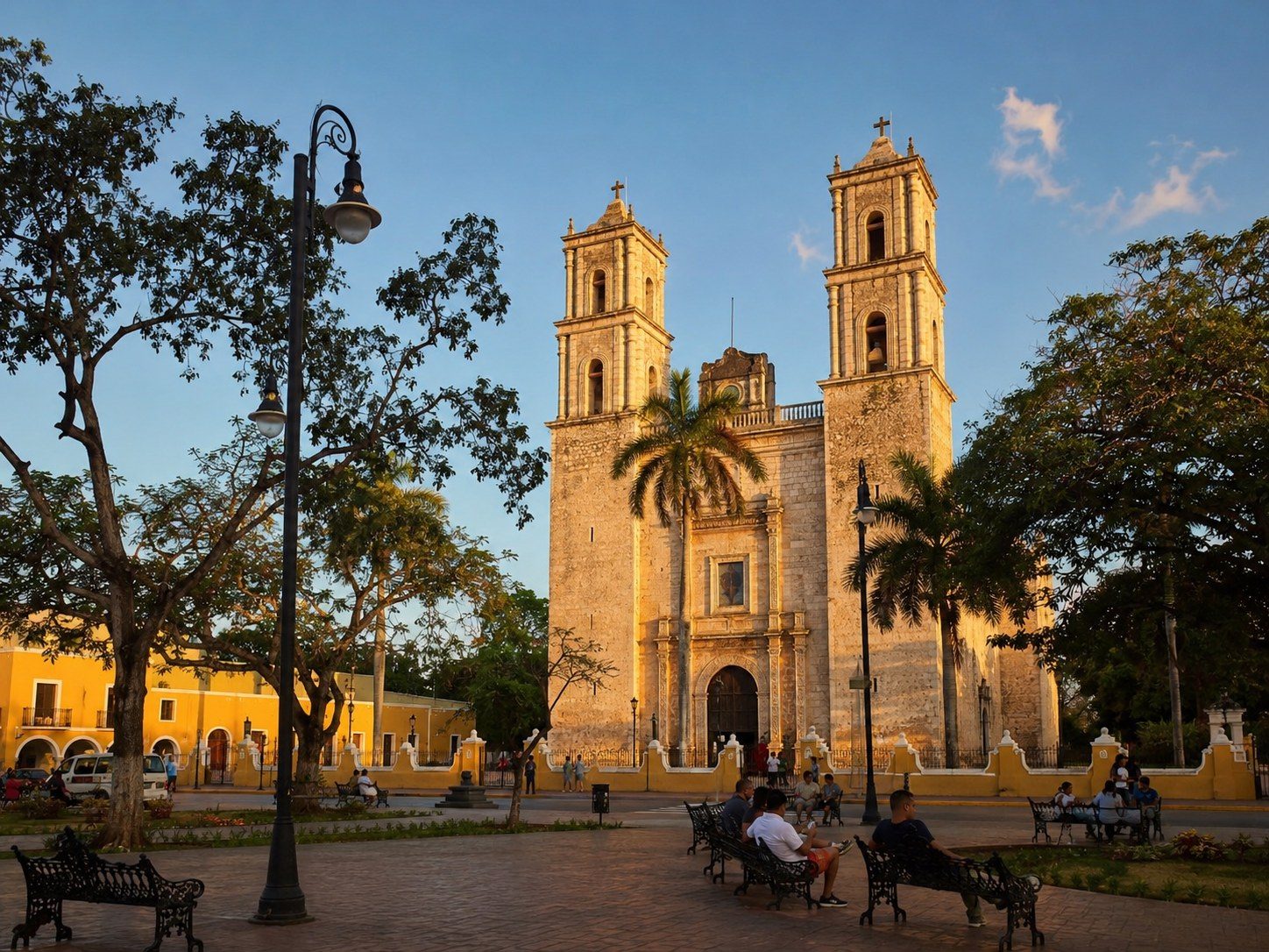 Wide view of Valladolid’s main square with Iglesia de San Servacio and everyday city activity.