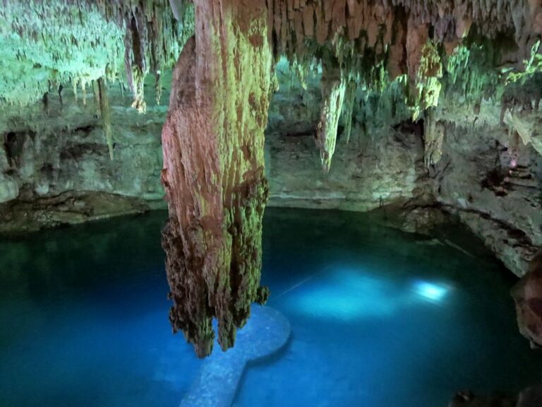 Cenote Suytún cave near Valladolid with its central platform and overhead light