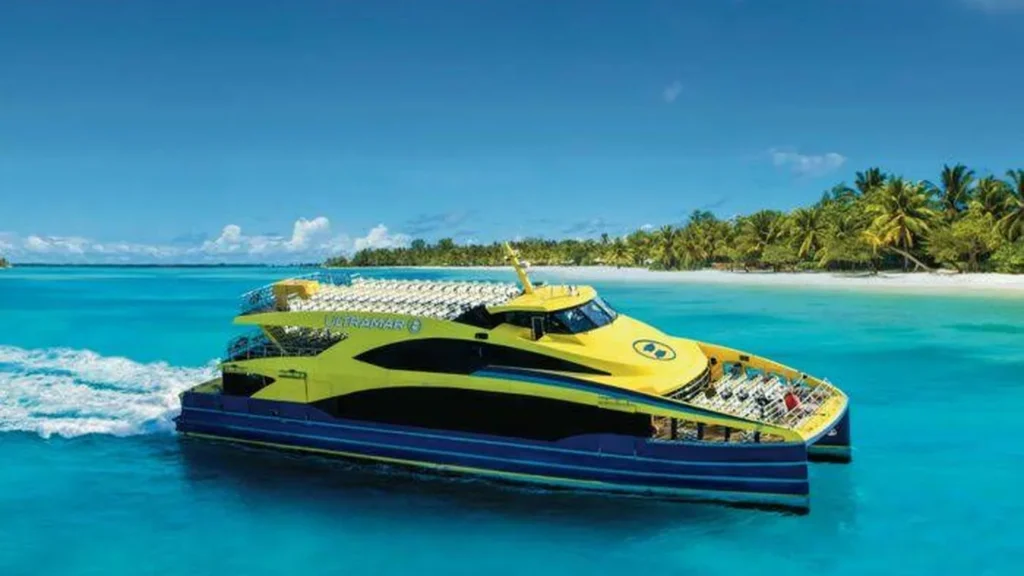 Ultramar passenger ferry crossing turquoise Caribbean water