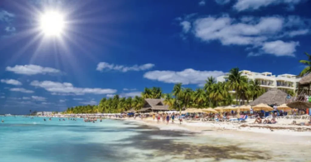 Turquoise Caribbean beach and palms on Isla Mujeres