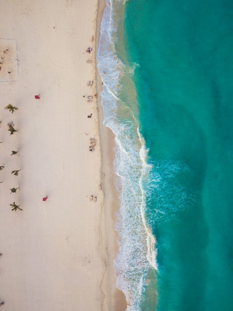 Aerial view of Cancun beach and turquoise Caribbean water.